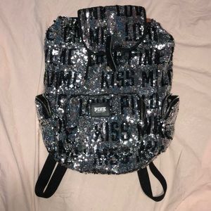 Pink sparkly back pack, covered in a bleach spill